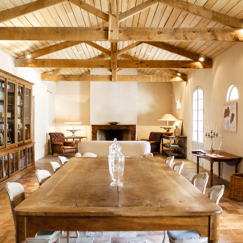 Home interior with roof beams Rich rural French house interior
